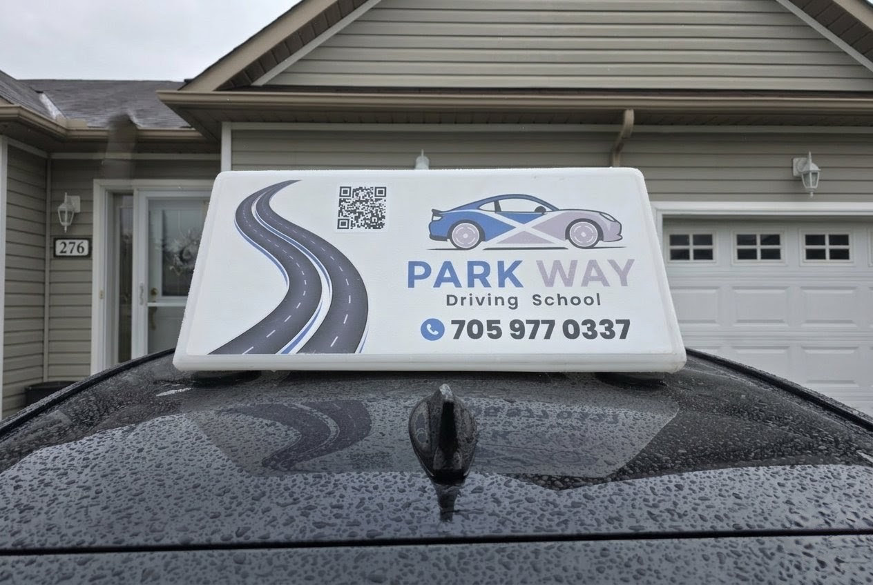 Parkway Driving School roof sign and phone number